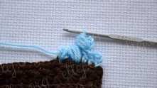 Yarn over, and pull the loop (make ch 1).