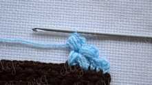 Again YO and pull yarn through last loops on the hook.