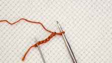 Chain (ch) 6. Join with slip stitch (sl st) to form a ring.