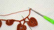 Work ch 6. Dc in window center (needle marked).