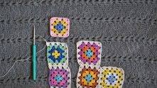 Edging another one motif and join it. Join next motif with first and third sides.