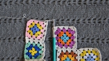 The first side is joined.  Edging second side. Third side join to 4-th motif of second row of motifs.
