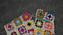 Join one side of  the latest motif to the very first motif in fabric. Join fabric in round.