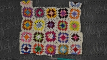 Edging all unfinished sides of the motifs across.