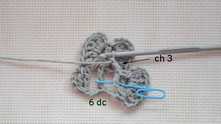 Work ch 3. 6 dc in the same space (blue marker).
