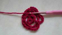Work the central petal around of the initial ring.