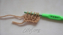 Work 4 incomplete dc's. Yarn over (YO), and pull through all loops on the hook.