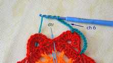Work ch 6. Double treble crochet (dtr) in dc between a petals.