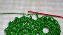 Work ch 2. 1 sc in next picot. Turn the work.