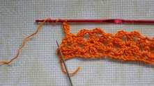 Treble crochet (tr) at the end of row. That's the difference with Row 1.