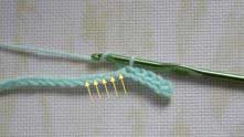 Half double crochet (hdc) in the next 5 stitches.