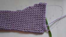 Approaching the moment where the decreases start. Decreases may be worked by just skipping the last stitch in the row.