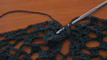 And once again, YO and pull loop. In other words: 3 half double crochets (hdc) together. Now YO and pull yarn through all loops on hook.