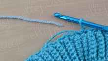 Join round with sleep stitch (sl st). Add to work light blue color yarn.