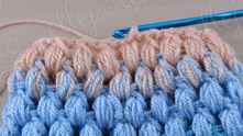 Will decrease the number of puff stitches in the next row.