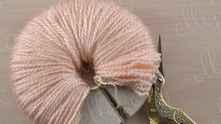Cut a circle and drawn threads together with silk chain very hard.