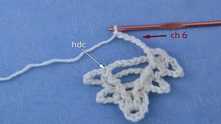 Work ch 6 (for fine yarn ch 7). Do split at the end of the row: Hdc in top of next dc.