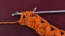 YO and pull yarn through all loops on hook, except one. YO, and pull through last 2 loops on the hook.