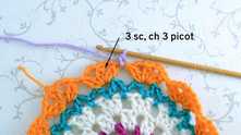 3 sc in this space, ch 3 for picot.