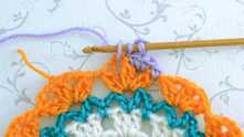 Begin to work the first sc. Pulled up the loop, yarn over and pull through all loops on the hook.