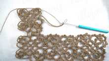 Work ch 27 for the pass to the next motif. Working it to the last row too.