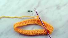 Front Post double crochet (FPdc) in next dc around.
