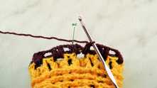 Join row with sc in the top of first Puff stitch and repeat all the steps from the second row of this color.