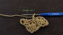 Cluster with puff stitches in the next middle dc, ch 1.