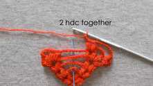 2 half double crochet (hdc) together (you can work puff stitch) in all chains around.
