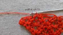 Puff st in the same space, ch 11.