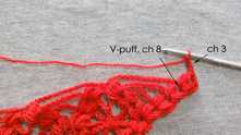 Only 3 ch in the first V-puff st, instead of ch 6. Further we do according to the chart: V-puff st in the same V-puff st, ch 8.