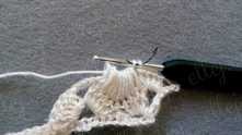 Yarn over, and pull through last 2 loops on the hook. First long hdc9tog complete.