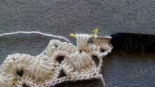 YO and pull yarn through all loops on the hook, except one, YO, and pull through last 2 loops.