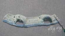 Row 5. The whole row is single crochets (56 sc). We make 8 stitches under the chains.