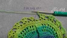 2 dc tog, ch 1 (or ch 2 and join with 2 slip st as you can see on next crochet chart)