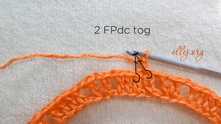 Row 2. 2 Front Post double crochet (FPdc) together. 1st FPdc in the beg chain around, 2nd FPdc in the next dc around.