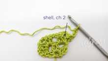 Row 3. All rows of the shawl start in the same way: Shell in the Shell, ch 2.