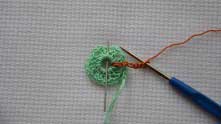 Ch 6. Sc between 4 dc. Insert the hook as needle marked.