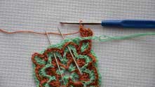 Working shells in the places marked with needles. Do not forget to bring green thread on the right side.