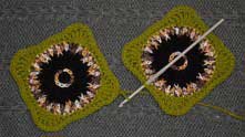 Connect thread in a corner of first motif, insert hook in the middle of the second motif side.