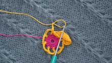 Chain 6 (ch-6 lp made). Remove the hook from the loop and insert it in dc between the 10 dc and 6 dc. Yarn over yellow loop and pull it through.