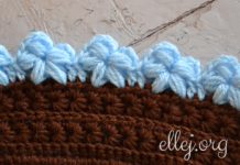Edging with puff stitch flowers Edging with puff stitch flowers